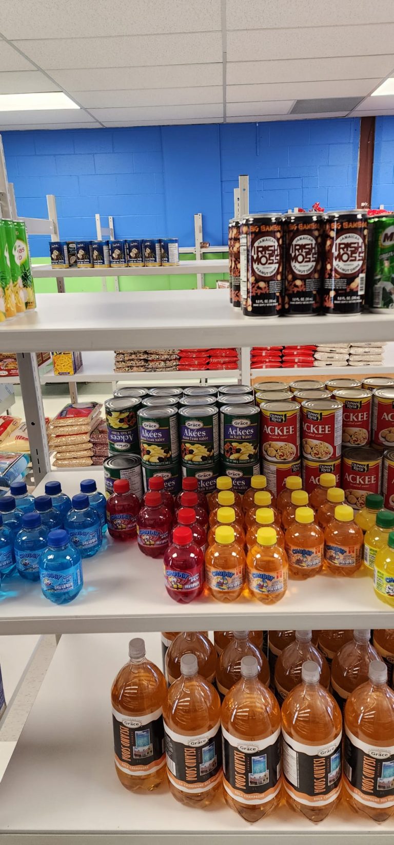 Close up shot of drinks on the shelves of Sunshine Grocers West Indian Store